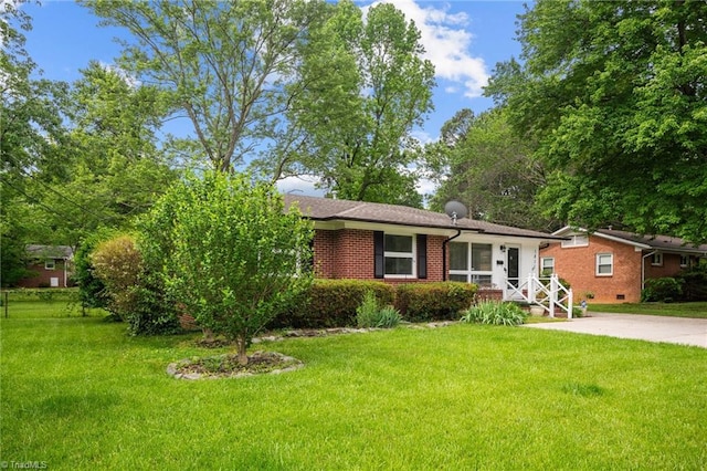 view of front of home with a front yard