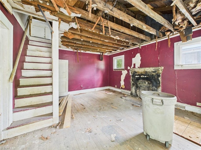525 Chandler St, Winston-Salem, NC 27101 - basement with stairs and hardwood / wood-style floors