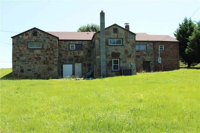 157 W Brocktown Rd, Moravian Falls, NC 28654 - rear view of property featuring stone siding and a chimney