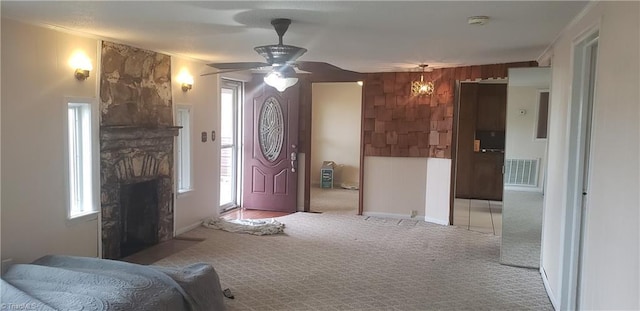 157 W Brocktown Rd, Moravian Falls, NC 28654 - carpeted foyer entrance with a ceiling fan and a fireplace
