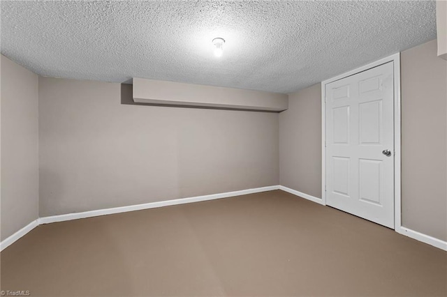 basement with a textured ceiling