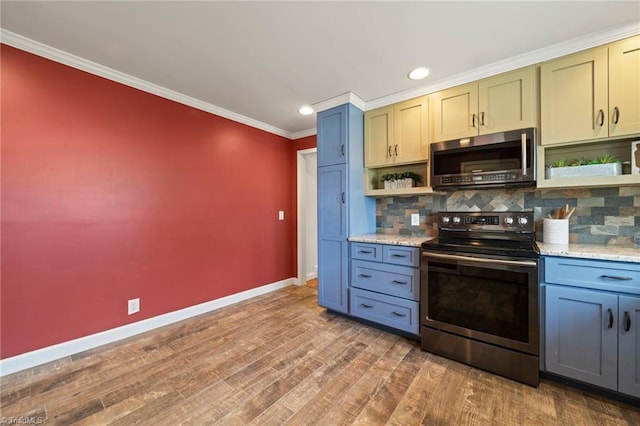 kitchen featuring stainless steel appliances, tasteful backsplash, wood finished floors, and open shelves