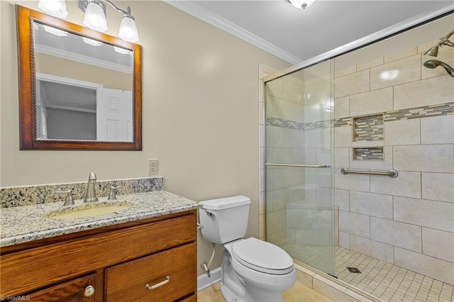 bathroom with vanity, toilet, an enclosed shower, and ornamental molding