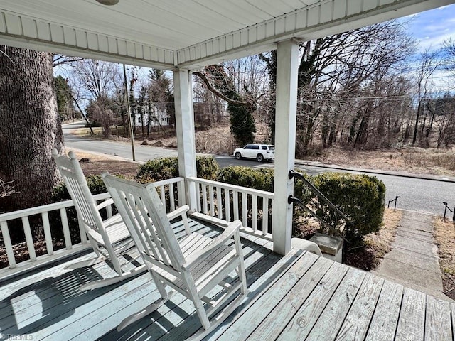 wooden deck featuring a porch