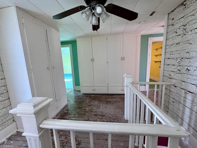 hallway with dark wood-type flooring