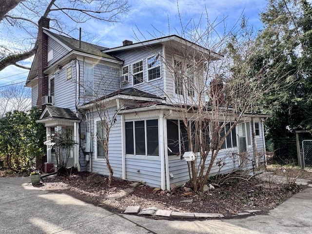 view of front of property with a sunroom