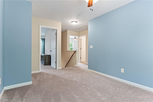 822 Blue Lake Dr, Mebane, NC 27302 - carpeted spare room featuring attic access, ceiling fan, and a smoke detector