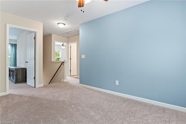 822 Blue Lake Dr, Mebane, NC 27302 - carpeted empty room with attic access, ceiling fan, and a smoke detector