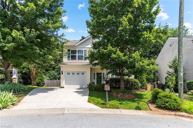 822 Blue Lake Dr, Mebane, NC 27302 - obstructed view of property featuring concrete driveway and an attached garage