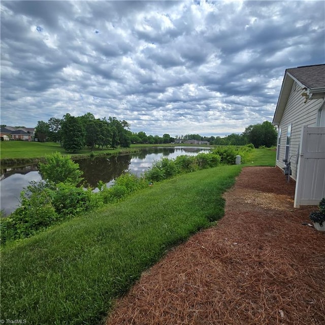 exterior space with a water view