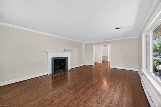 503 Tarleton Ave, Burlington, NC 27215 - unfurnished living room with ornamental molding, dark wood-type flooring, and a fireplace with flush hearth