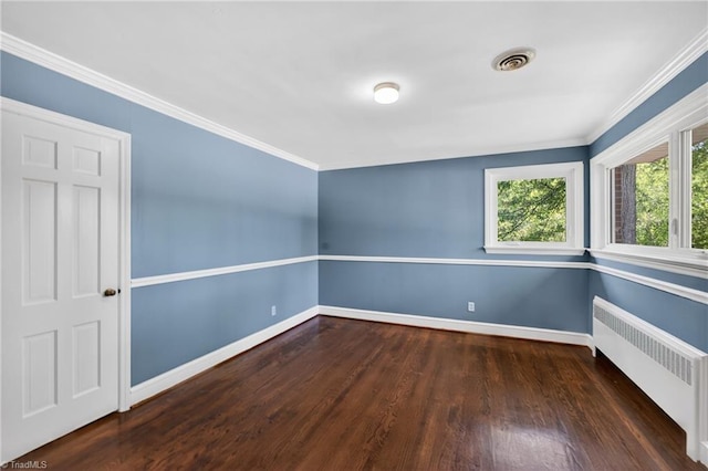 503 Tarleton Ave, Burlington, NC 27215 - empty room with radiator heating unit, wood finished floors, and crown molding
