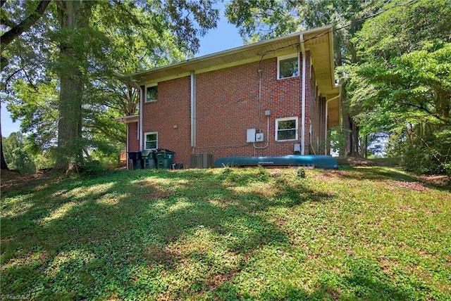 503 Tarleton Ave, Burlington, NC 27215 - back of property with brick siding and a yard