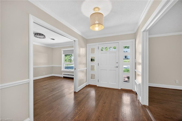 503 Tarleton Ave, Burlington, NC 27215 - entrance foyer featuring wood finished floors, a textured ceiling, and ornamental molding