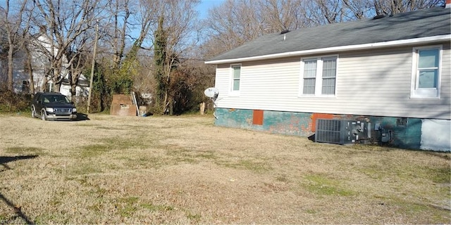 view of property exterior featuring a yard and cooling unit