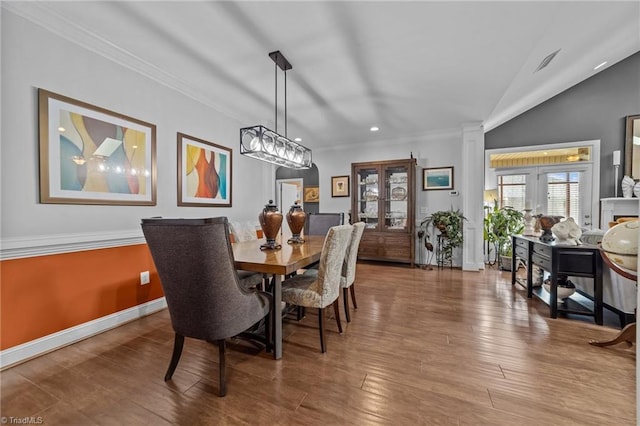 653 Piedmont Crossing Dr, High Point, NC 27265 - dining area with crown molding, wood finished floors, lofted ceiling, and recessed lighting