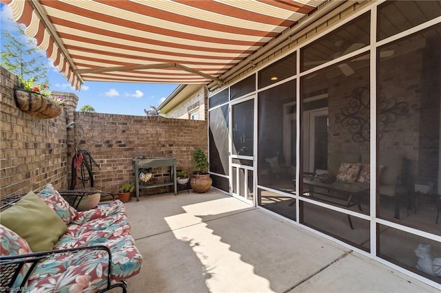 653 Piedmont Crossing Dr, High Point, NC 27265 - view of patio featuring a sunroom