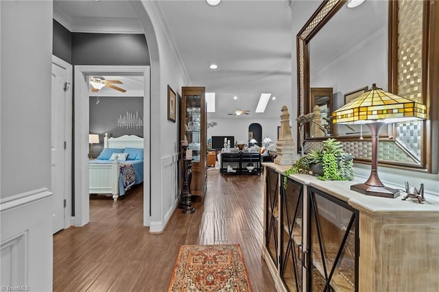 653 Piedmont Crossing Dr, High Point, NC 27265 - hall with ornamental molding, wood finished floors, recessed lighting, and a skylight