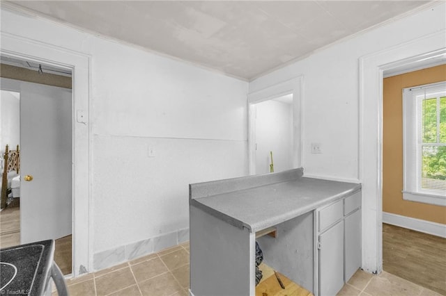 1821 Johnson St, High Point, NC 27262 - kitchen featuring crown molding and baseboards
