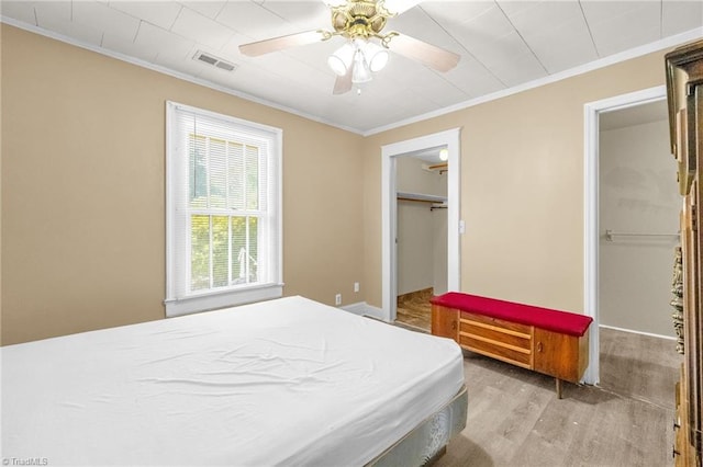 1821 Johnson St, High Point, NC 27262 - bedroom with crown molding, wood finished floors, and visible vents