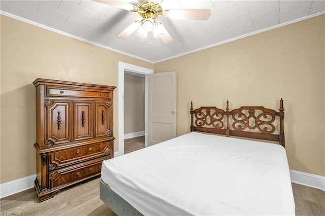 1821 Johnson St, High Point, NC 27262 - bedroom with crown molding, a ceiling fan, and baseboards