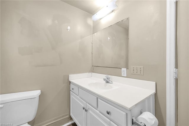 1821 Johnson St, High Point, NC 27262 - bathroom featuring vanity, baseboards, and toilet