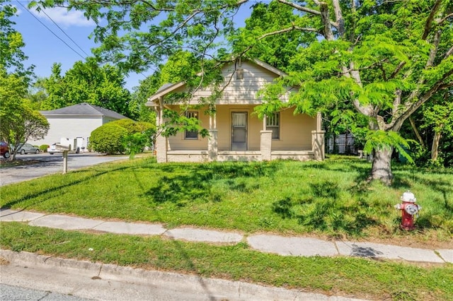 1821 Johnson St, High Point, NC 27262 - view of front of house with a garage and covered porch