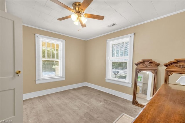 1821 Johnson St, High Point, NC 27262 - empty room with baseboards, ornamental molding, a ceiling fan, and wood finished floors