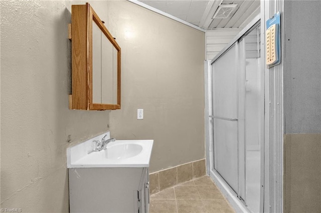 1821 Johnson St, High Point, NC 27262 - full bath featuring vanity, tile patterned floors, visible vents, and a shower stall