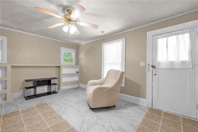 1821 Johnson St, High Point, NC 27262 - sitting room with baseboards, ornamental molding, ceiling fan, and visible vents