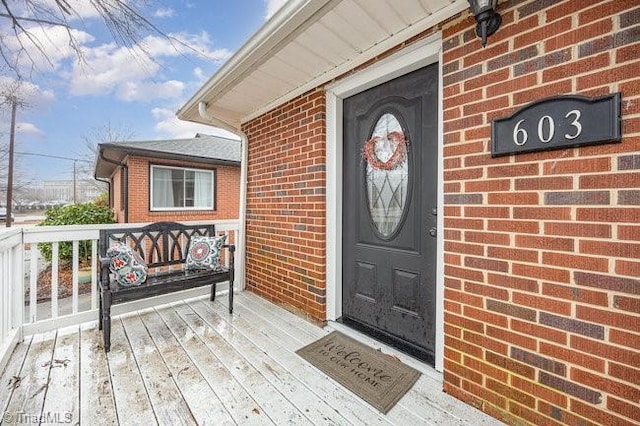 entrance to property with covered porch