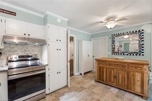 kitchen featuring stainless steel electric range oven, under cabinet range hood, ceiling fan, white cabinets, and tasteful backsplash