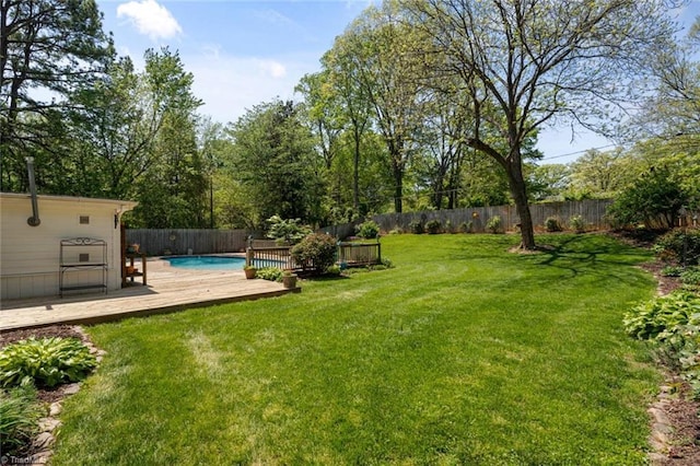 view of yard with a wooden deck