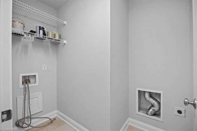 6832 Main St Unit 226, Wilmington, NC 28405 - washroom with electric dryer hookup, hookup for a washing machine, and tile patterned flooring