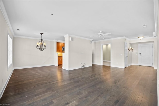 6832 Main St Unit 226, Wilmington, NC 28405 - unfurnished living room featuring a chandelier, dark wood-type flooring, ceiling fan, and crown molding