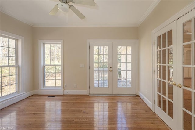8105 Summit Springs Ct, Browns Summit, NC 27214 - doorway to outside featuring french doors, hardwood / wood-style floors, baseboards, and ornamental molding