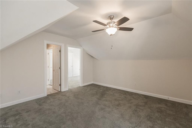 8105 Summit Springs Ct, Browns Summit, NC 27214 - additional living space with lofted ceiling, carpet floors, a ceiling fan, and baseboards