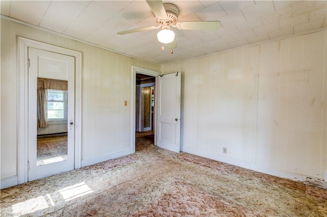 2405 Ellington St, Greensboro, NC 27403 - unfurnished bedroom with carpet, ceiling fan, and crown molding