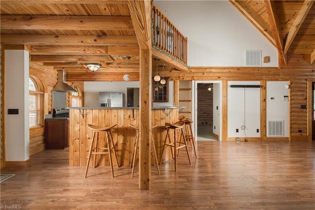 1310 Lynchburg Rd, Westfield, NC 27053 - dining room with wooden ceiling, visible vents, and rustic walls
