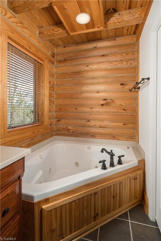 1310 Lynchburg Rd, Westfield, NC 27053 - bathroom featuring tile patterned floors, beamed ceiling, wood ceiling, and a whirlpool tub
