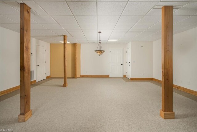 1310 Lynchburg Rd, Westfield, NC 27053 - finished basement with visible vents, light colored carpet, baseboards, and a drop ceiling