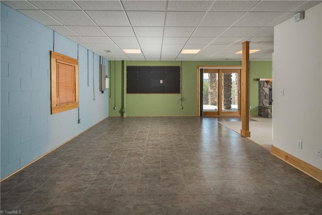 1310 Lynchburg Rd, Westfield, NC 27053 - spare room featuring a paneled ceiling and concrete block wall