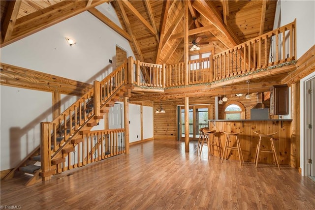 1310 Lynchburg Rd, Westfield, NC 27053 - living room featuring beamed ceiling, wood ceiling, wood finished floors, and a ceiling fan