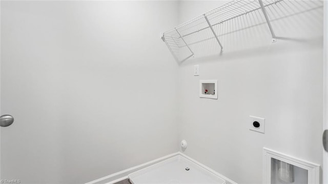 clothes washing area featuring washer hookup, laundry area, hookup for a gas dryer, and electric dryer hookup