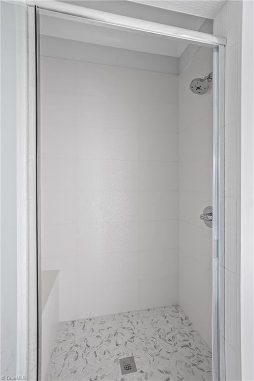 full bathroom with a stall shower