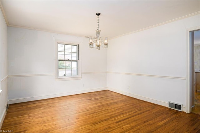 515 N Pine Valley Rd N, Winston-Salem, NC 27106 - spare room featuring a chandelier, wood-type flooring, and crown molding