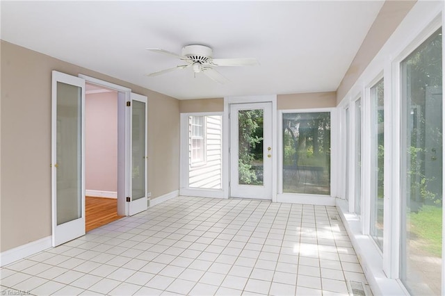 515 N Pine Valley Rd N, Winston-Salem, NC 27106 - unfurnished sunroom with baseboards and tile patterned flooring