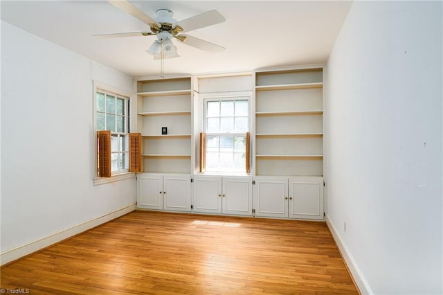 515 N Pine Valley Rd N, Winston-Salem, NC 27106 - unfurnished room with light wood-style flooring, a ceiling fan, and plenty of natural light