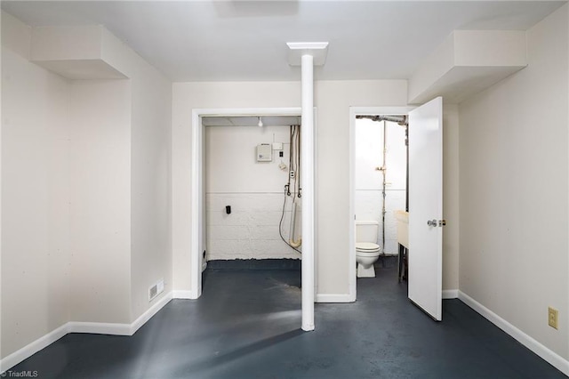 515 N Pine Valley Rd N, Winston-Salem, NC 27106 - unfurnished bedroom featuring finished concrete flooring and baseboards