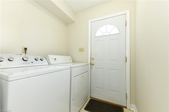 laundry room featuring washer and dryer